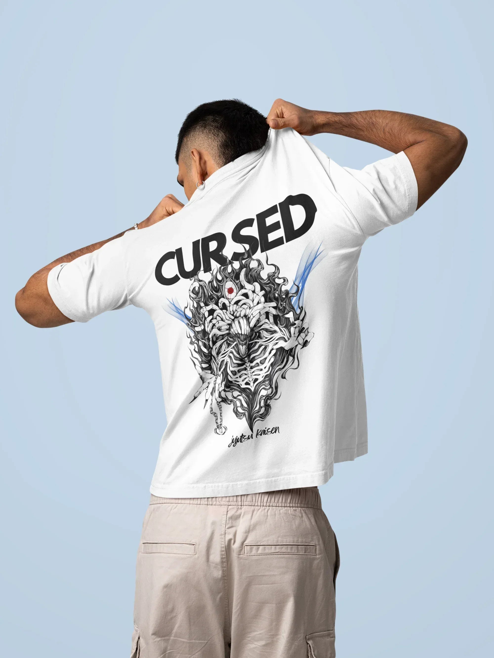 back-view-mockup-featuring-a-man-trying-to-take-off-his-oversized-t-shirt-in-a-studio-m57444 - Drippyx