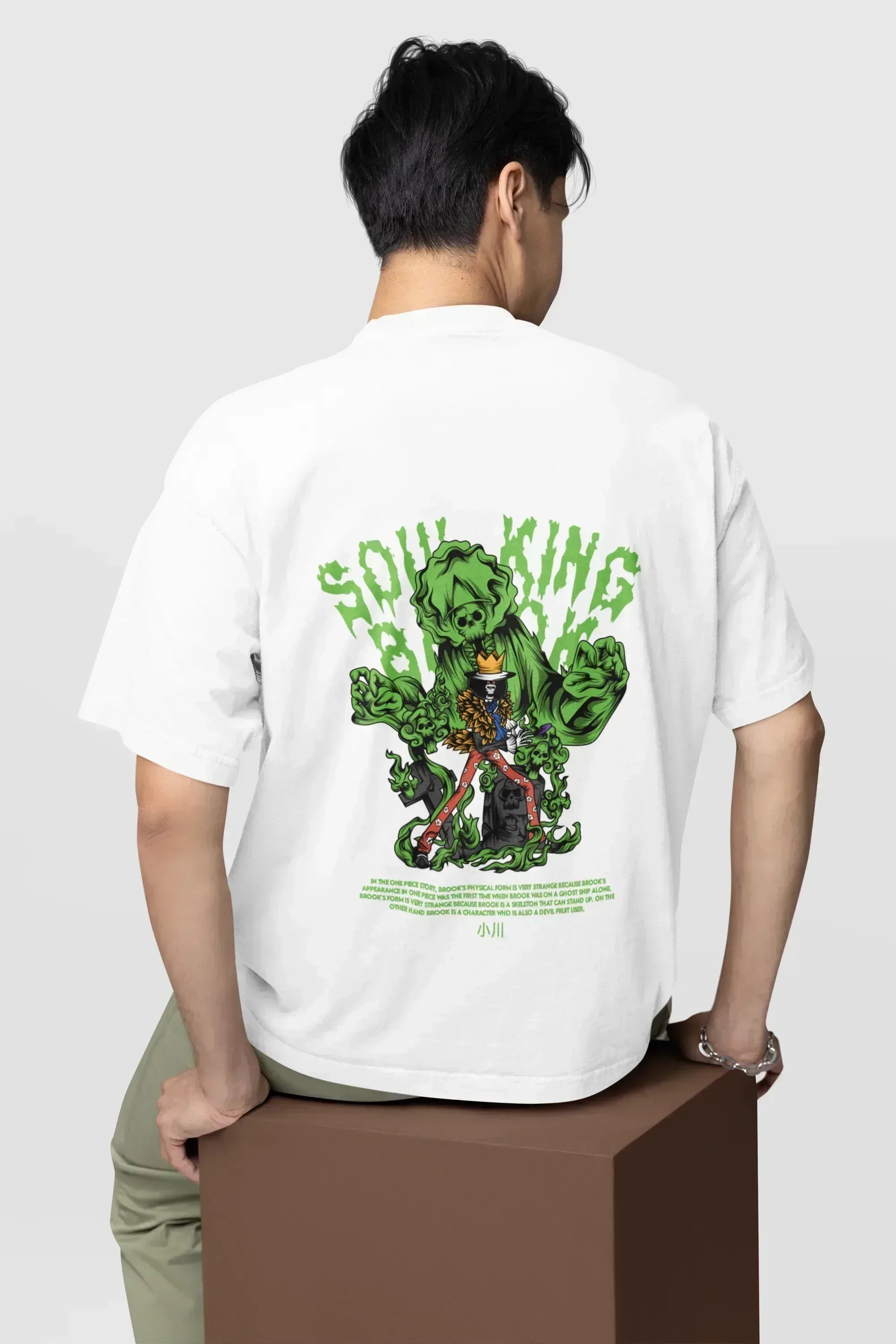 back-view-oversized-tee-mockup-of-a-man-sitting-on-a-customizable-cube-m38922_5 - Drippyx