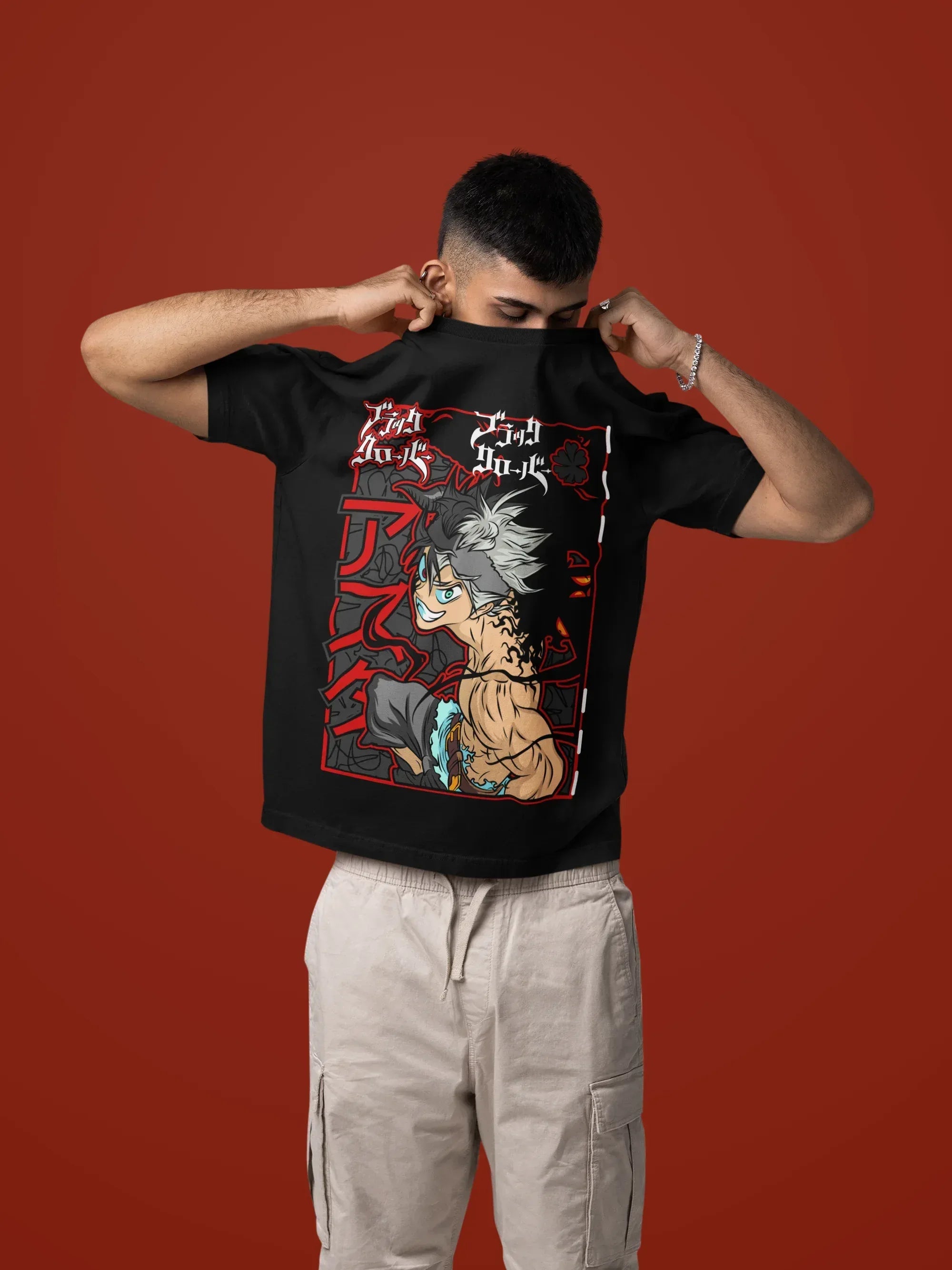 mockup-of-a-man-taking-off-his-oversized-t-shirt-in-a-studio-setting-m57443 - Drippyx