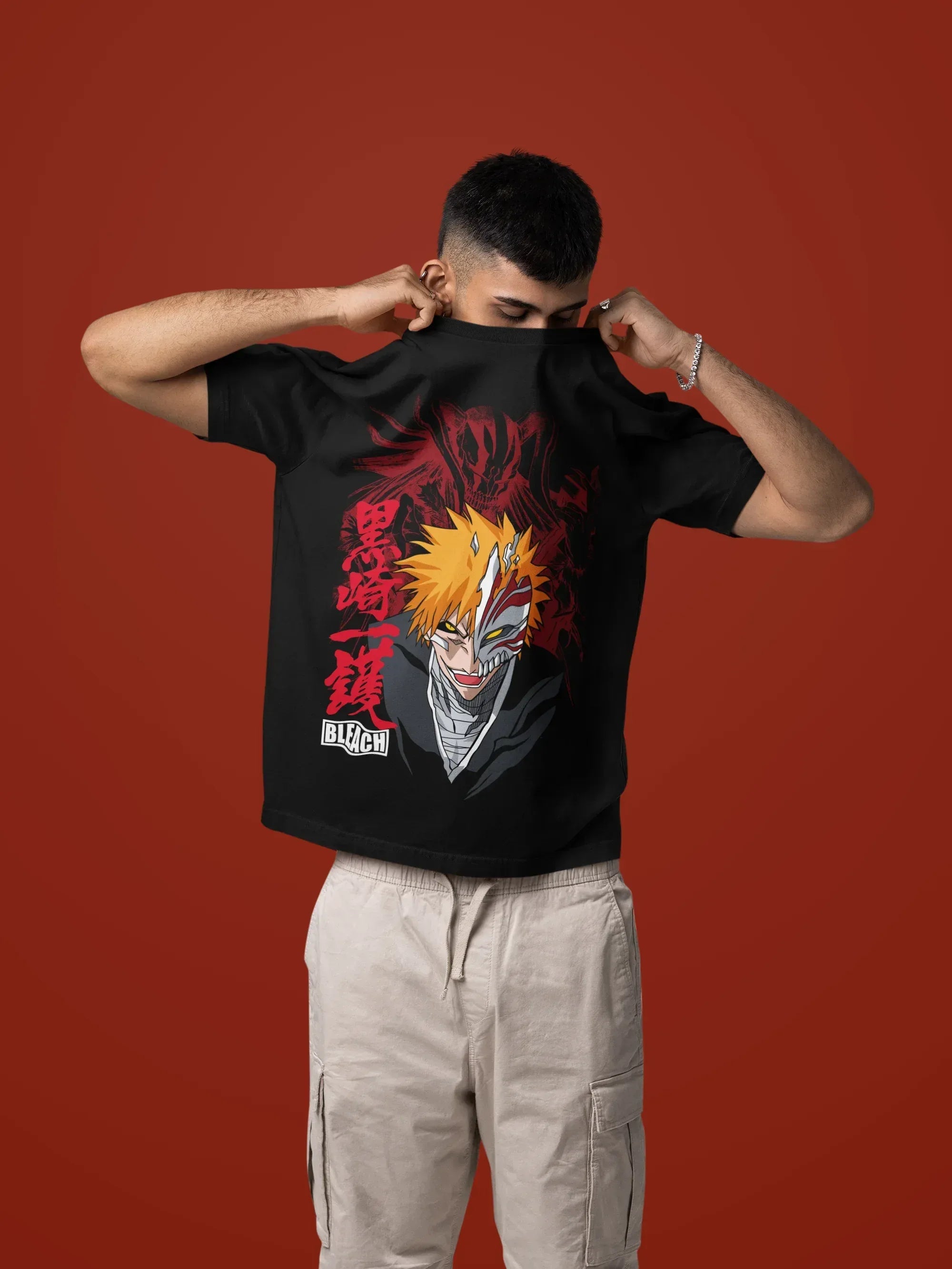 mockup-of-a-man-taking-off-his-oversized-t-shirt-in-a-studio-setting-m57443_1_91da4924-2013-47e2-b5e3-9a799a836578 - Drippyx