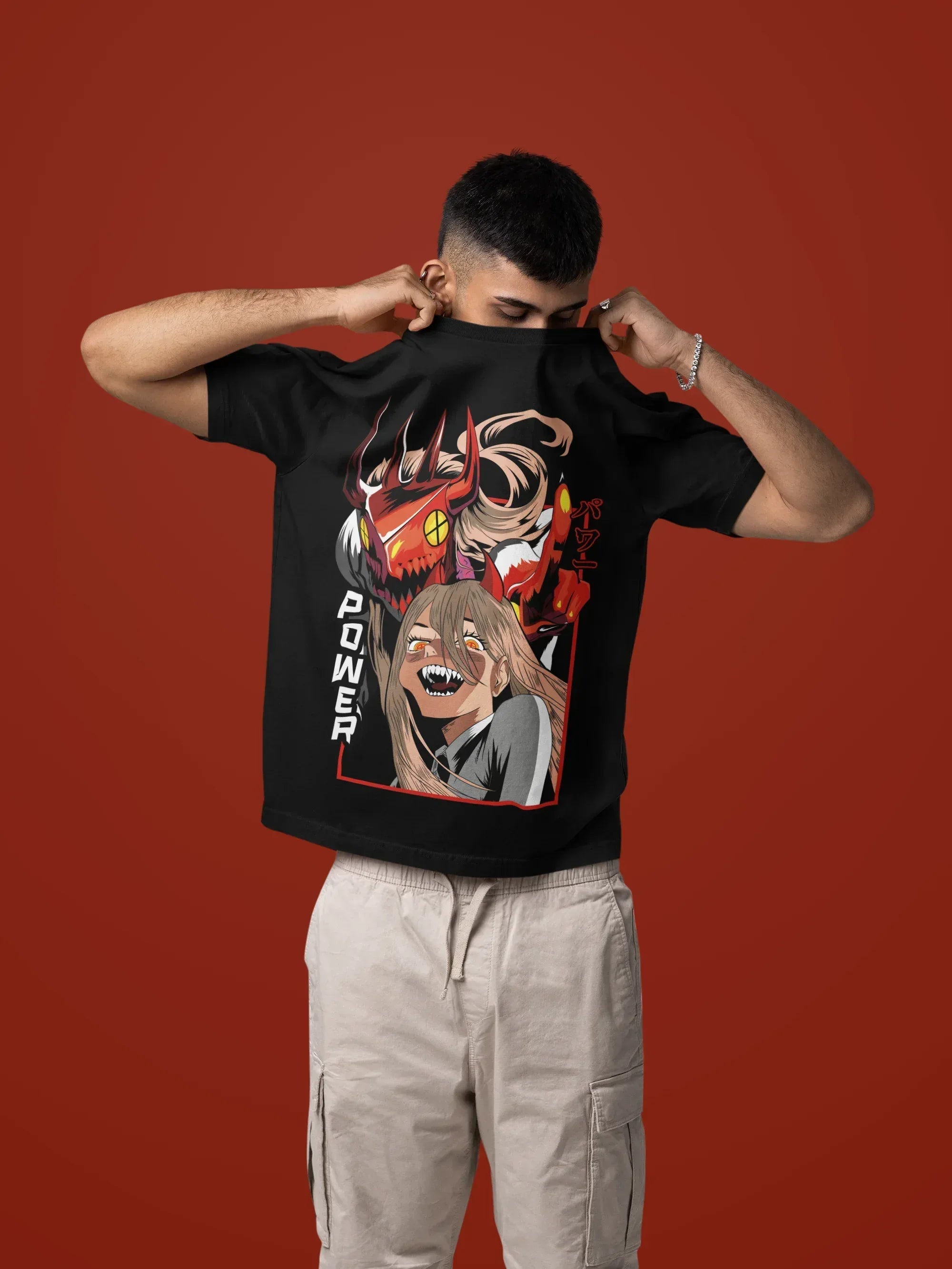 mockup-of-a-man-taking-off-his-oversized-t-shirt-in-a-studio-setting-m57443_5 - Drippyx