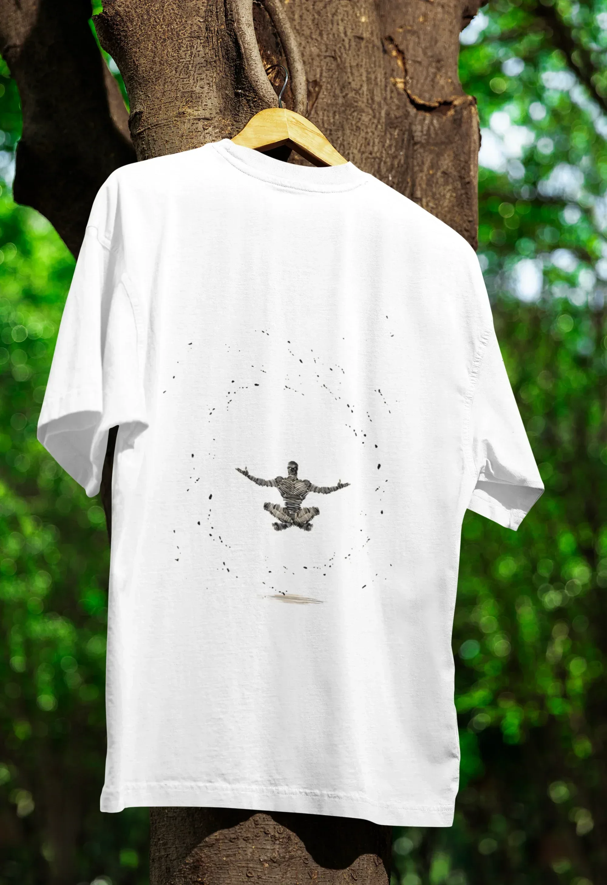 mockup-of-an-oversized-tee-hanging-from-a-tree-m39840_7 - Drippyx
