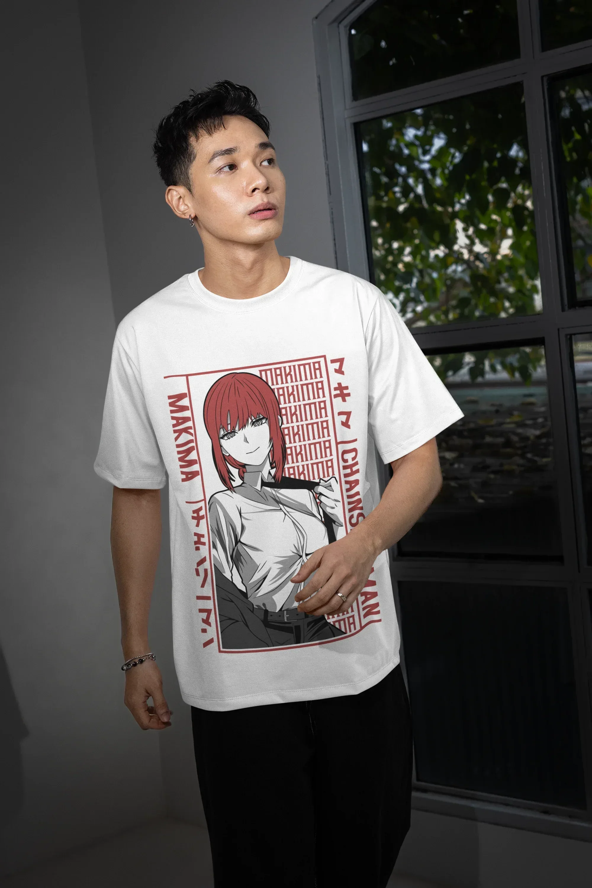 oversized-t-shirt-mockup-featuring-a-man-posing-with-a-serious-look-and-standing-near-a-window-m54148_2 - Drippyx