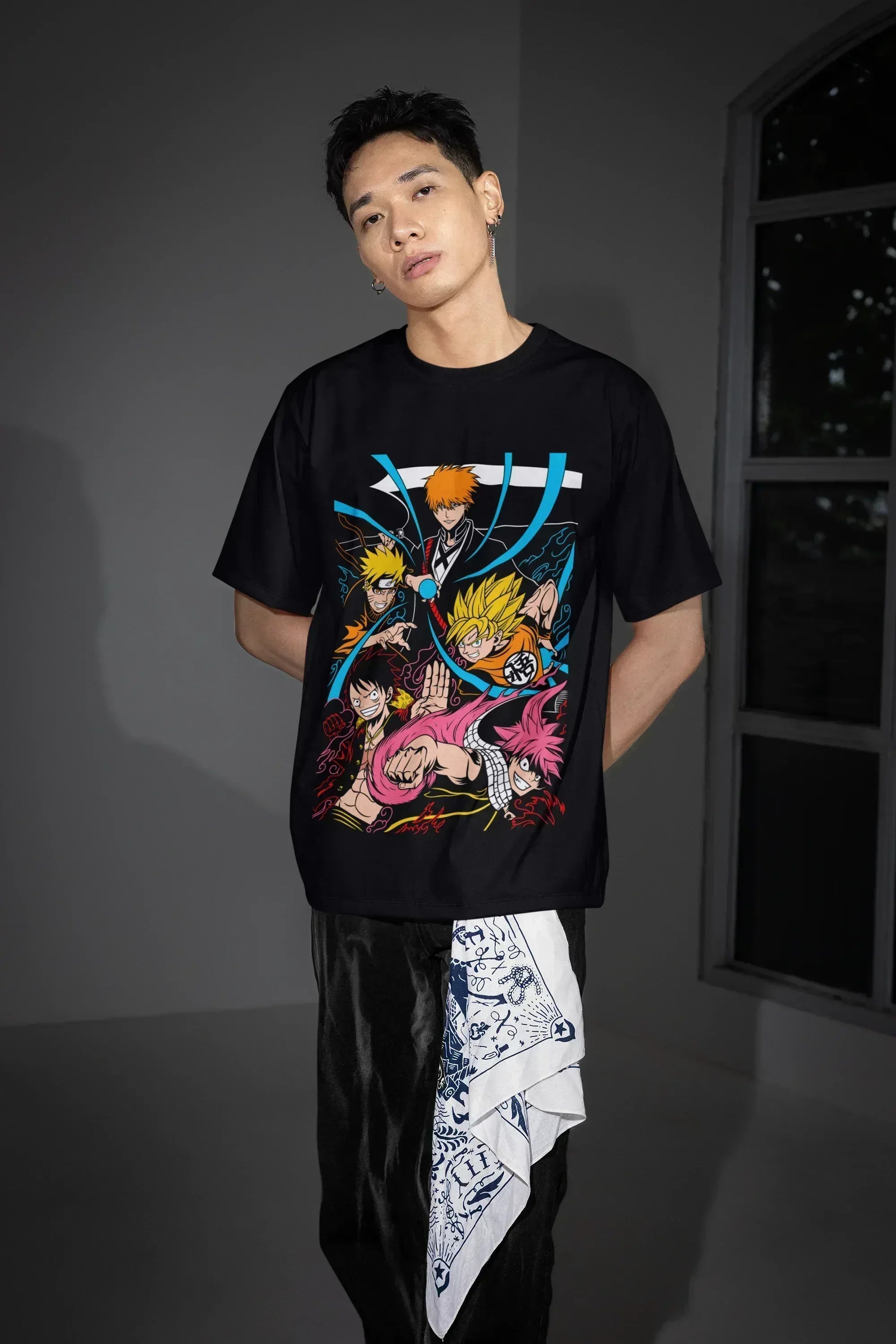 oversized-t-shirt-mockup-of-a-serious-man-posing-near-a-window-m54178 - Drippyx