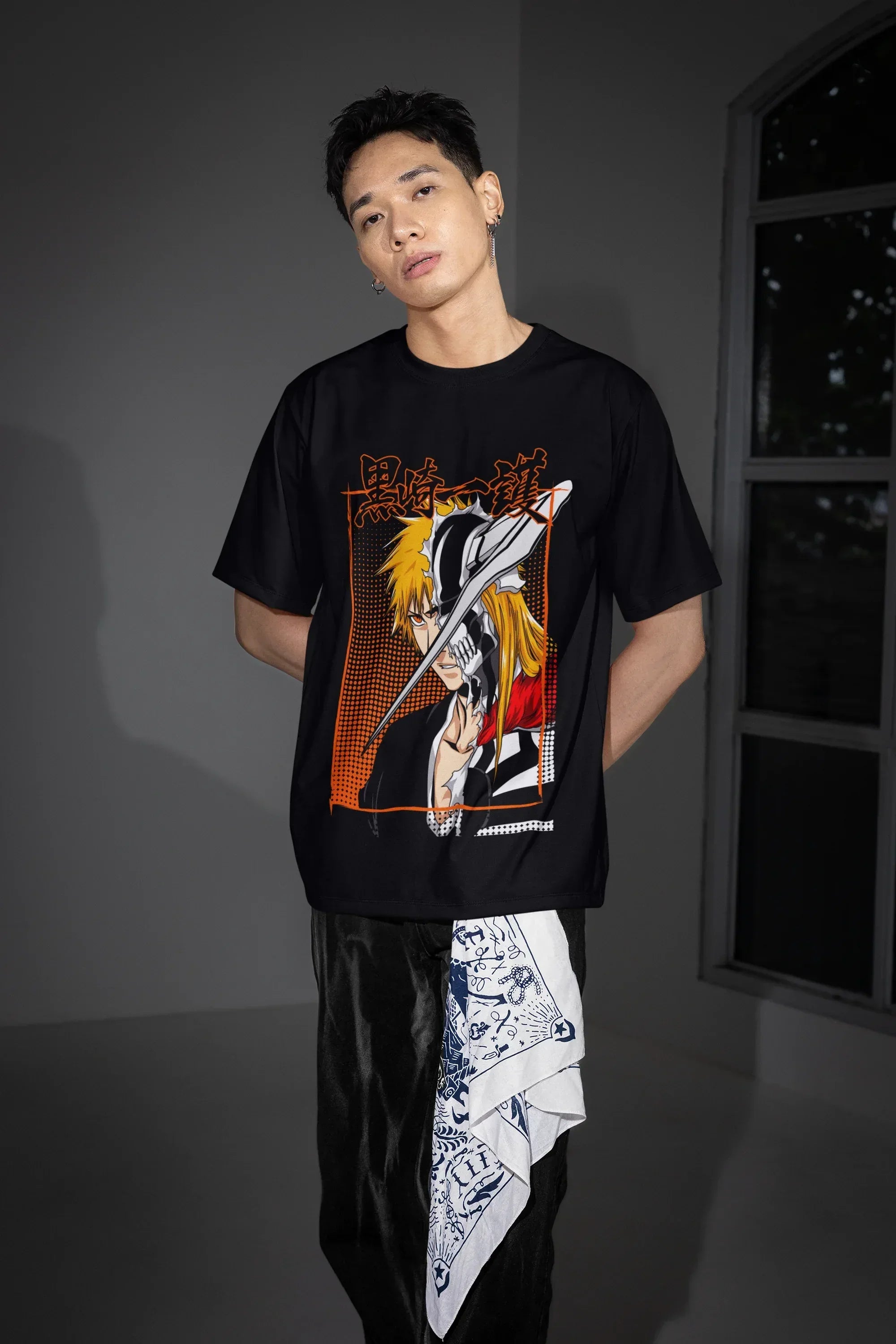 oversized-t-shirt-mockup-of-a-serious-man-posing-near-a-window-m54178_1 - Drippyx